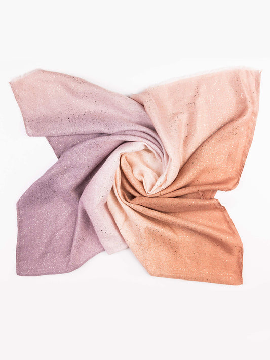 Folded fabric swatch in pink and peach colors on a white background